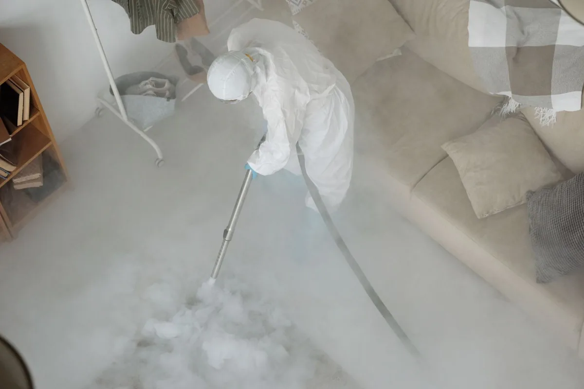 Biohazard cleanup technician in protective equipment, Baldwin, PA